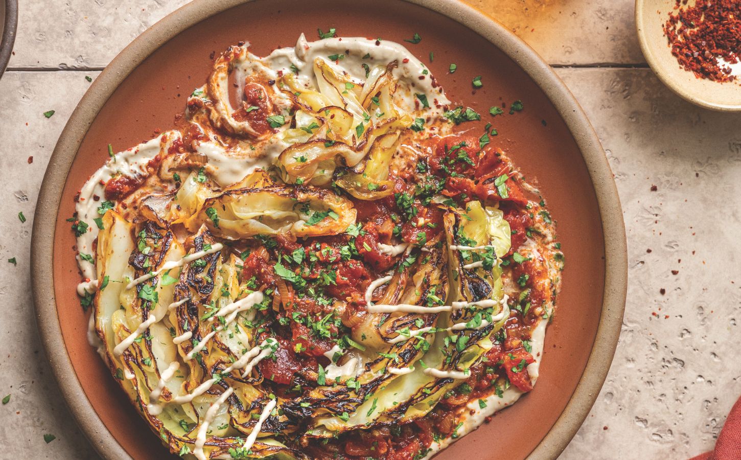 Buttery Charred Cabbage In Spiced Tomatoes With Tahini