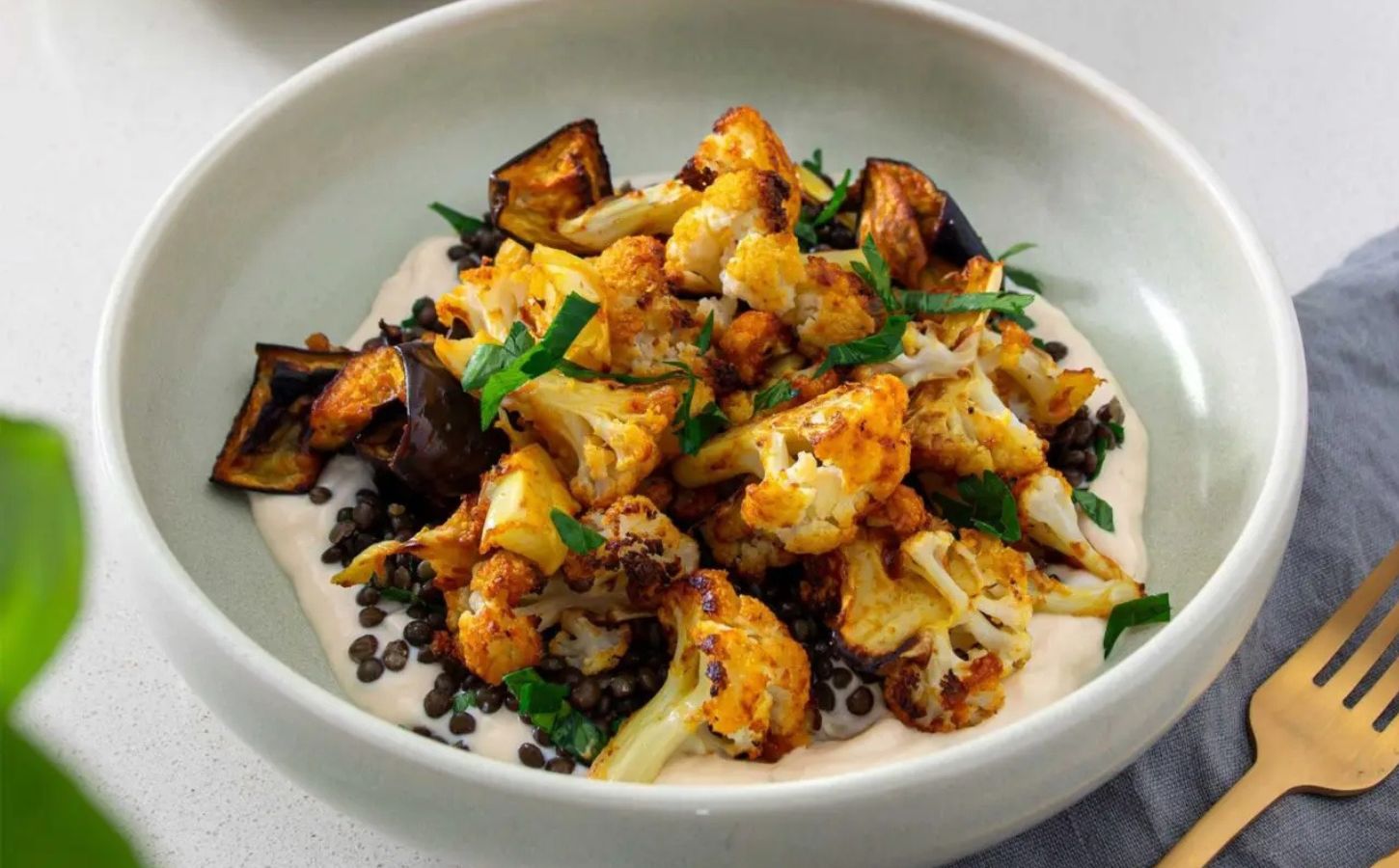 Try This Roasted Cauliflower Bowl With Garlic Confit Yogurt Dip