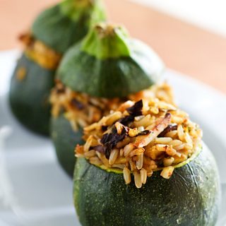Eight-Ball Zucchini Stuffed with Rice, Basil, and Sun-dried Tomatoes