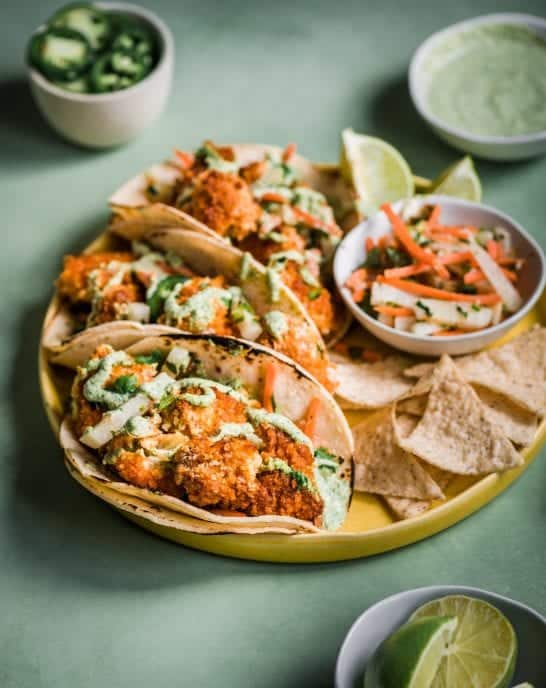 Crispy Spicy Cauliflower Tacos with Jicama-Carrot Slaw