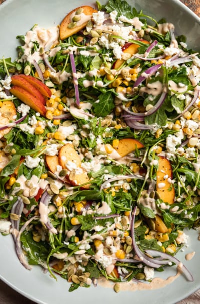 Fresh Summer Salad with Arugula, Corn & Spicy Cashew Dressing