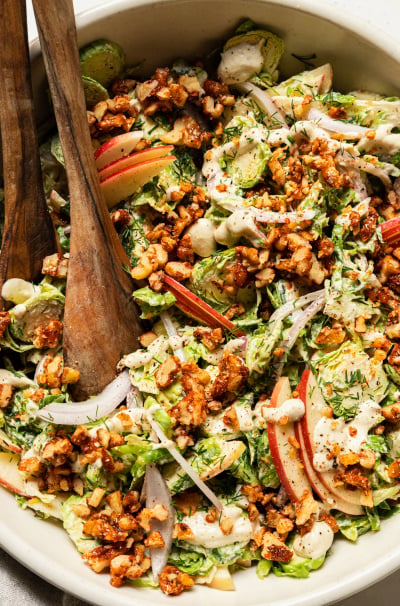 Shaved Brussels Sprouts Salad with Creamy Garlic Dressing & Spiced Maple Walnuts