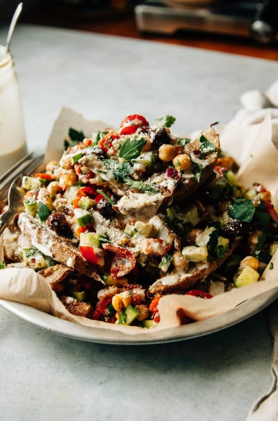 Loaded Shawarma-Spiced Fries with Crunchy Veg Salad and Lemony Tahini