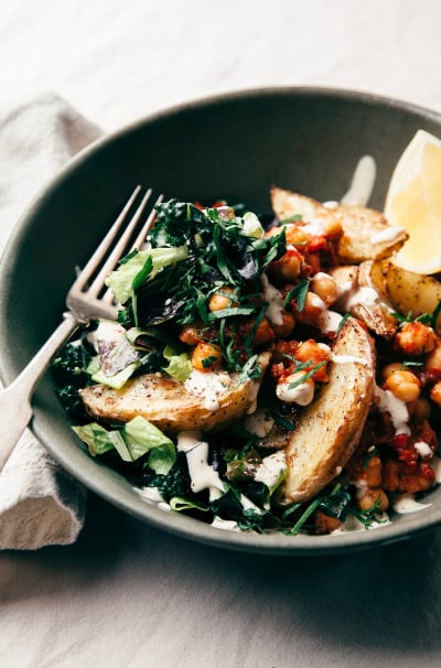 Harissa Chickpea Bowl with Potatoes, Lemony Tahini & Greens