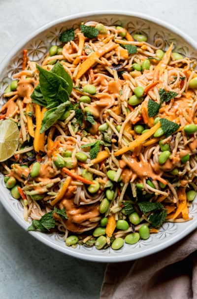 Mango Slaw Noodles with Peanut Sauce, Edamame & Herbs