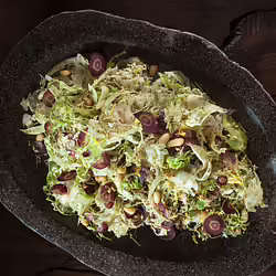 Vegan Shaved Brussels Sprouts With Zaâatar, Lemon, and Pine Nuts