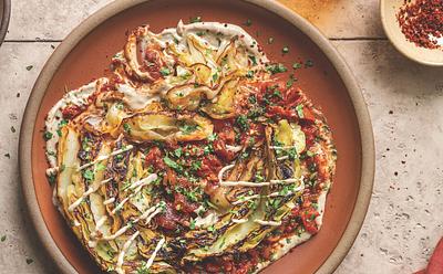 Buttery Charred Cabbage In Spiced Tomatoes With Tahini