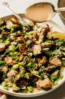 Crispy Roasted Brussels Sprouts with Edamame & Peanut Sauce