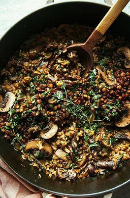 Mushroom Brown Rice Bake with Caramelized Shallots, Crispy Lentils & Gremolata