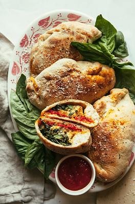 Spicy Vegan Sausage Calzones with Ricotta & Broccoli Rabe