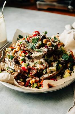 Loaded Shawarma-Spiced Fries with Crunchy Veg Salad and Lemony Tahini
