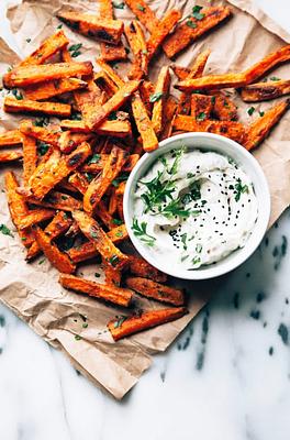 Crispy Baked Sweet Potato Fries with Roasted Garlic Tahini Yogurt Dip