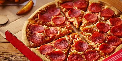 PETA Becomes a Shareholder of Domino’s Pizza, Will Urge Executives to Offer Vegan Cheese in the US
