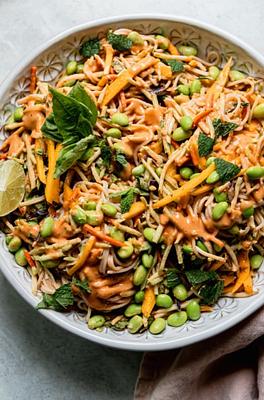 Mango Slaw Noodles with Peanut Sauce, Edamame & Herbs