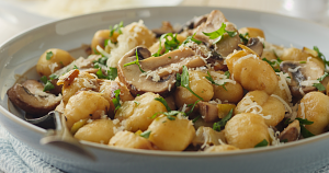 These pillowy plant-based gnocchi in garlic butter sauce are dangerously good