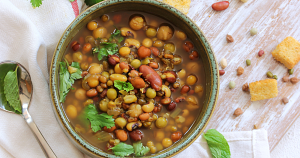 Warming lentil-barley vegan stew with herby swirl