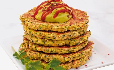 Quick And Crispy Zucchini Fritters With Avocado Crema